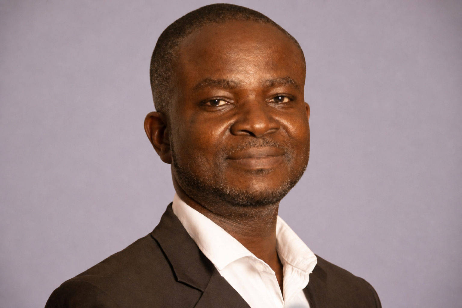 Portrait of Dr. SAMUEL ADU-ACHEAMPONG